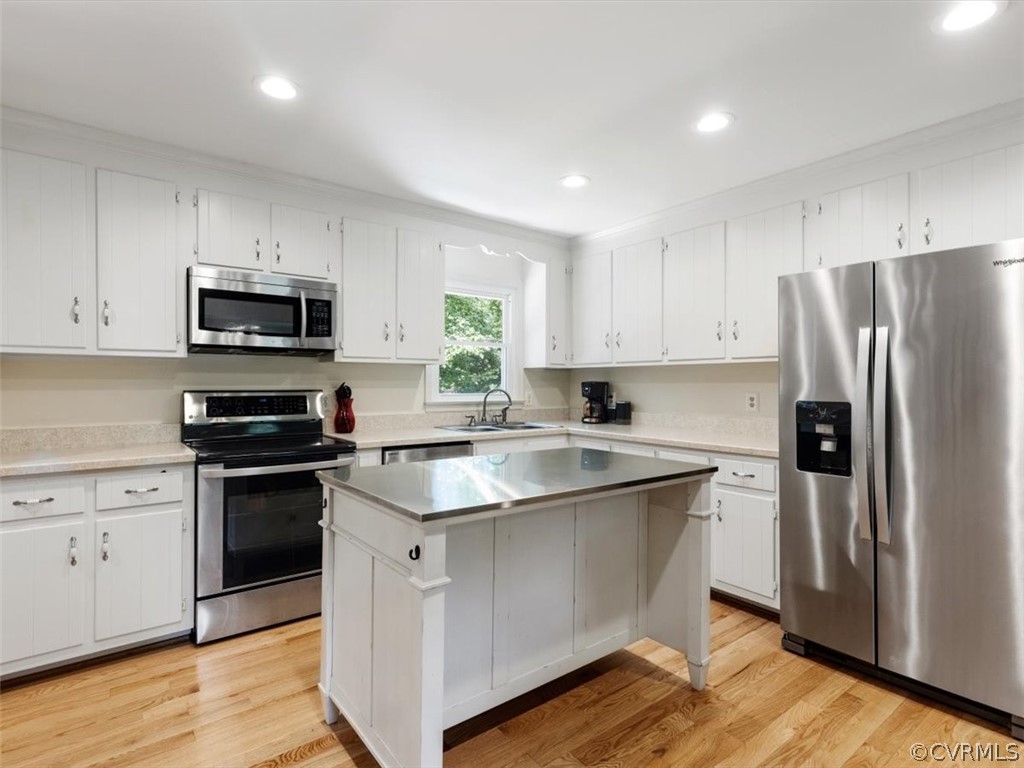 480 Eastman Road Chesterfield, VA 23236 - Photo 10 of 35 Kitchen features a large center island w/ bar stoo