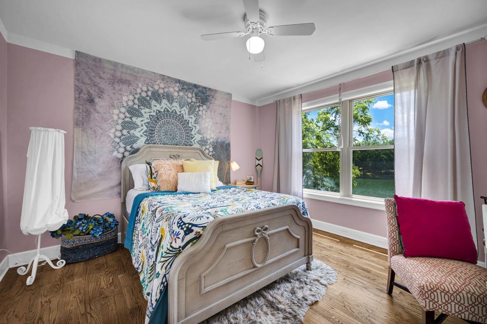 6 Barbados Court Putnam, IL 61560 - Photo 12 of 45 a bedroom with a bed and a couch