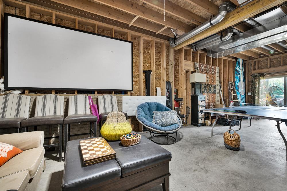 6 Barbados Court Putnam, IL 61560 - Photo 20 of 45 a living room with furniture and a book shelf