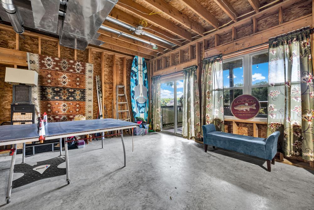 6 Barbados Court Putnam, IL 61560 - Photo 22 of 45 a view of a room with gym equipment