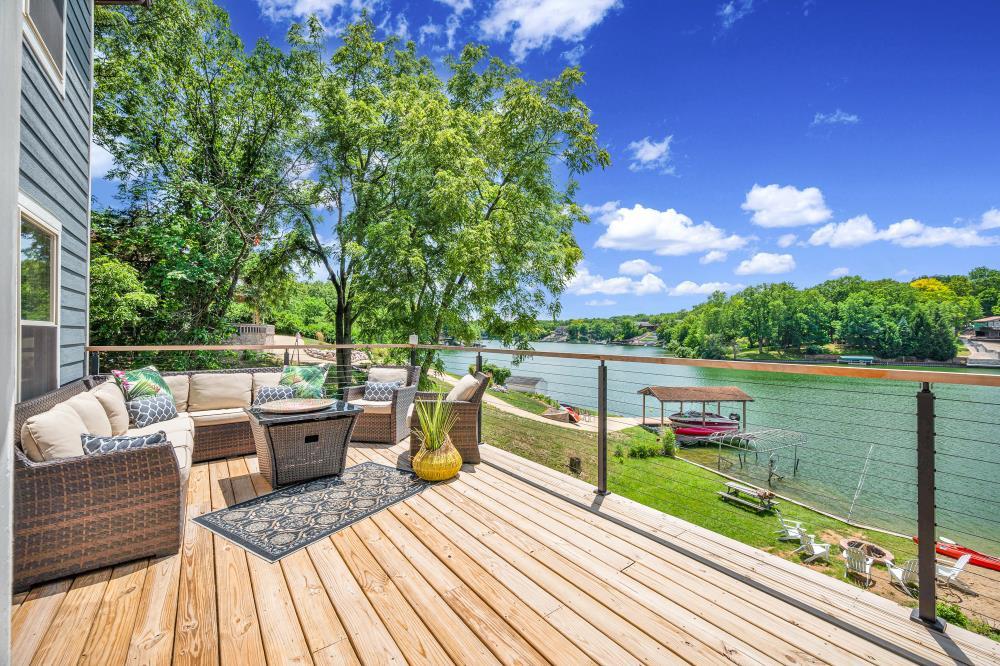 6 Barbados Court Putnam, IL 61560 - Photo 25 of 45 a view of balcony with wooden floor and outdoor seating