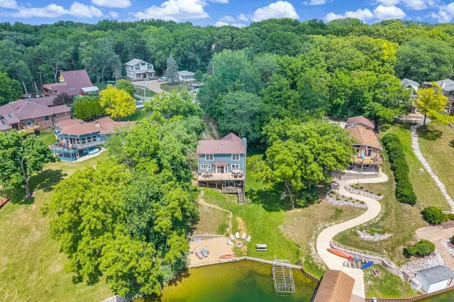 an aerial view of a house with a garden