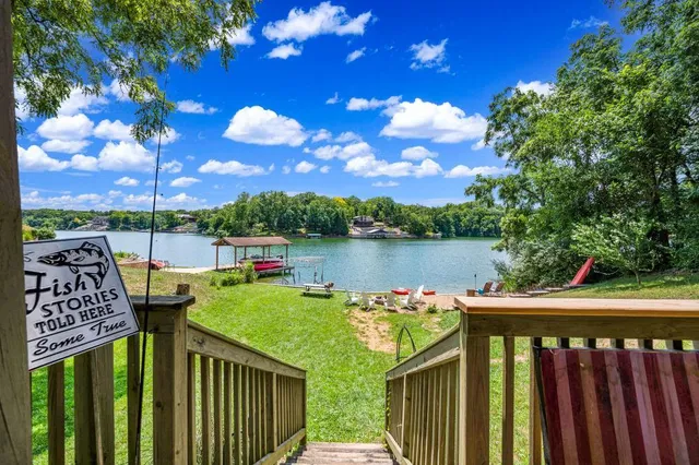 a view of a garden from a balcony