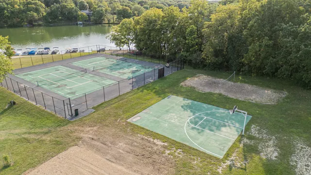 a view of a wooden deck and lake
