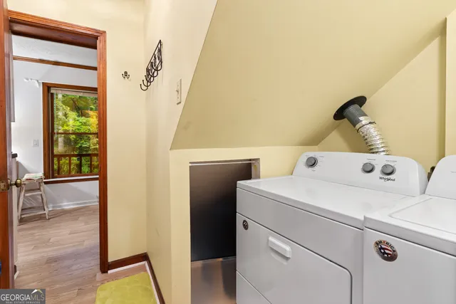 a utility room with dryer and washer
