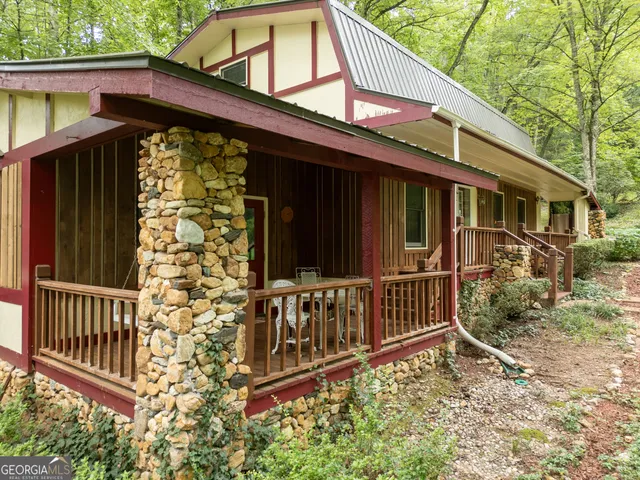 front view of a house with a large window