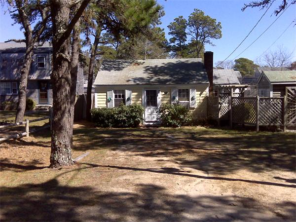 36 Edwards Road Dennis, MA 02639 - Photo 2 of 8 a front view of a house