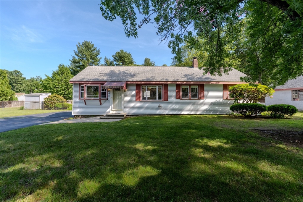 10 Primrose Road Billerica, MA 01821 - Photo 1 of 37 a view of a house with a yard potted plants and large tree