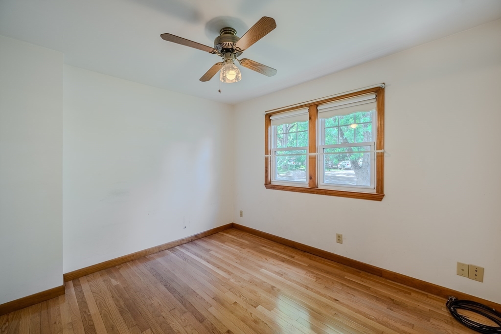 10 Primrose Road Billerica, MA 01821 - Photo 14 of 37 an empty room with a window