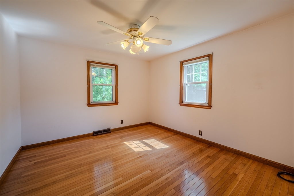 10 Primrose Road Billerica, MA 01821 - Photo 15 of 37 a view of empty room with wooden floor