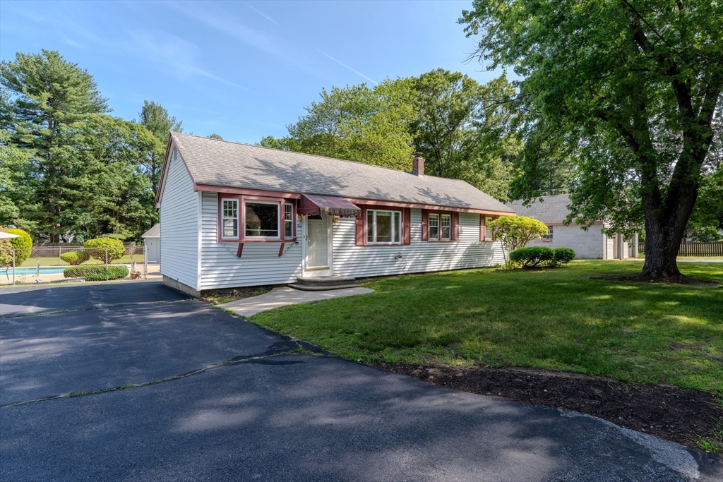 10 Primrose Road Billerica, MA 01821 - Photo 2 of 37 a view of a house with a yard