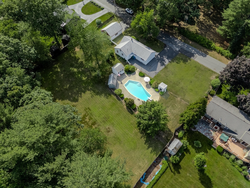 10 Primrose Road Billerica, MA 01821 - Photo 26 of 37 an aerial view of residential house with outdoor space and trees all around