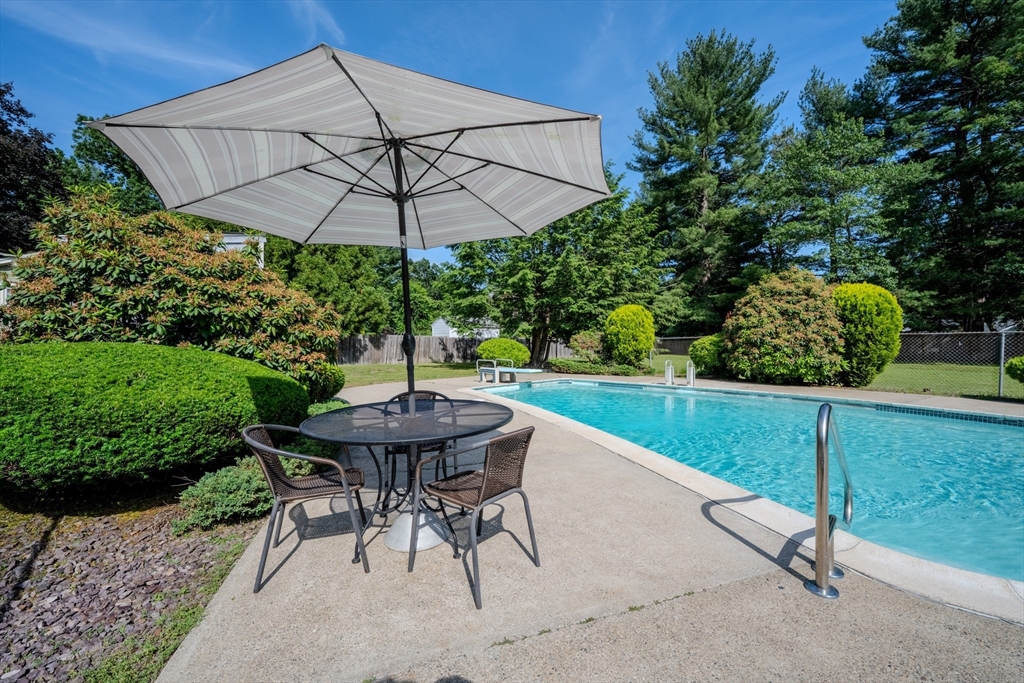 10 Primrose Road Billerica, MA 01821 - Photo 29 of 37 a view of a backyard with furniture and backyard