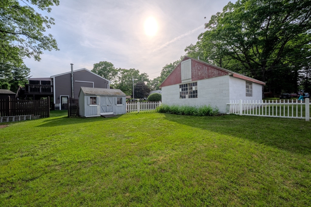 10 Primrose Road Billerica, MA 01821 - Photo 32 of 37 a front view of house with yard and green space