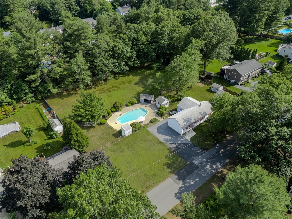 10 Primrose Road Billerica, MA 01821 - Photo 33 of 37 an aerial view of a house with a yard