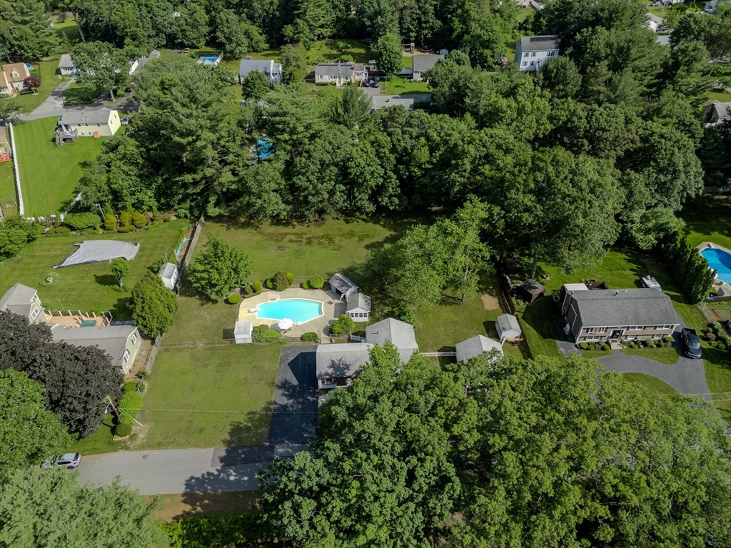 10 Primrose Road Billerica, MA 01821 - Photo 35 of 37 an aerial view of a house with a yard