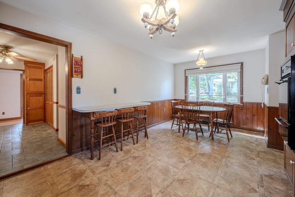 10 Primrose Road Billerica, MA 01821 - Photo 7 of 37 a view of a dining room with furniture window and outside view