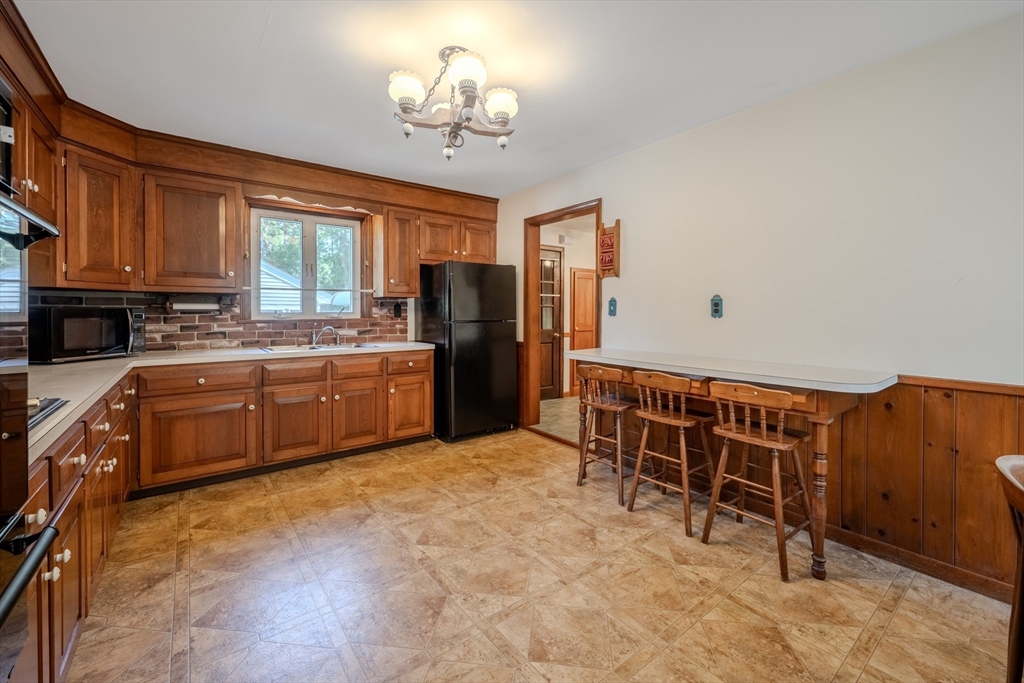 10 Primrose Road Billerica, MA 01821 - Photo 8 of 37 a bed room with furniture and a window