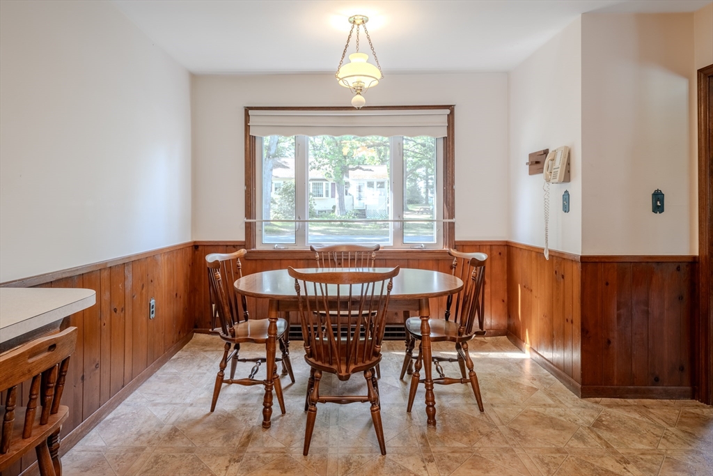 10 Primrose Road Billerica, MA 01821 - Photo 9 of 37 a view of a dining room with furniture window and wooden floor
