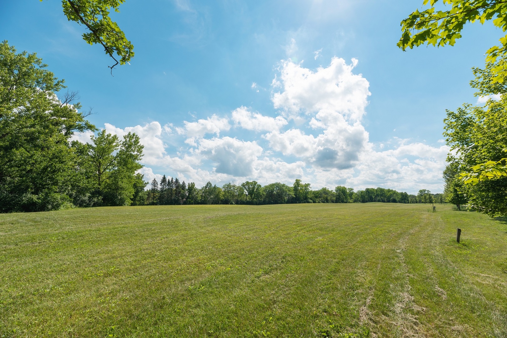 Lot 6 Whitehall Lane Lake Forest, IL 60045 - Photo 2 of 10 a view of yard with ocean and trees in the background