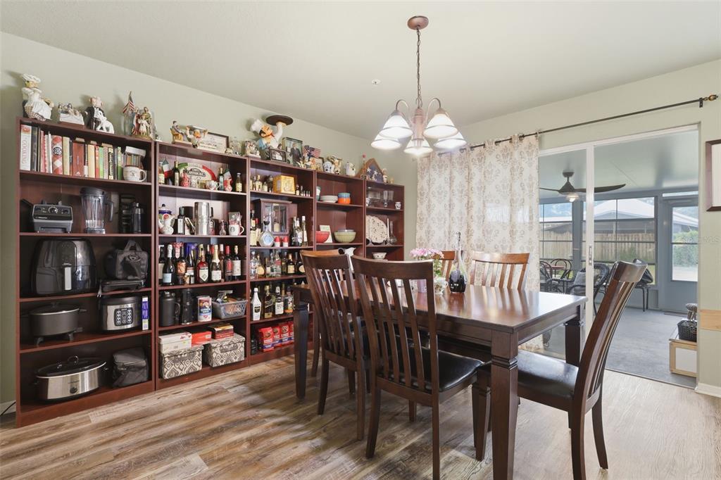 3440 Allston Lane Winter Park, FL 32792 - Photo 12 of 37 a view of a dining room with furniture window and wooden floor