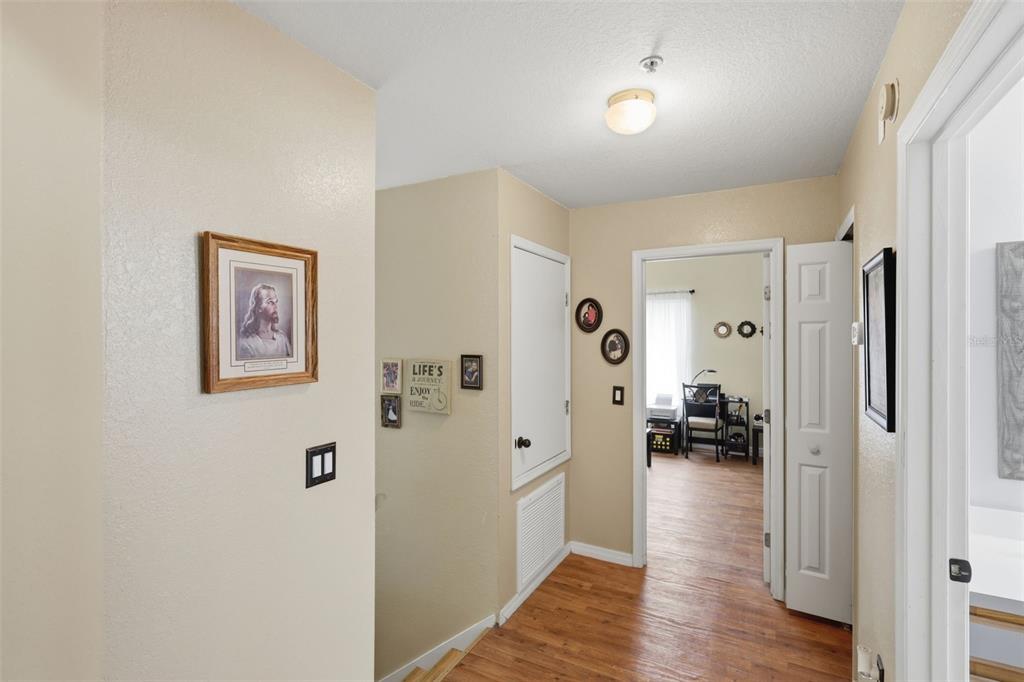 3440 Allston Lane Winter Park, FL 32792 - Photo 18 of 37 a view of a hallway with wooden floor windows and a livingroom