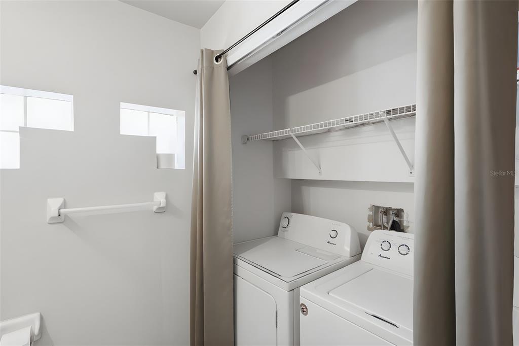 3440 Allston Lane Winter Park, FL 32792 - Photo 21 of 37 a view of storage and utility room with racks on the wall