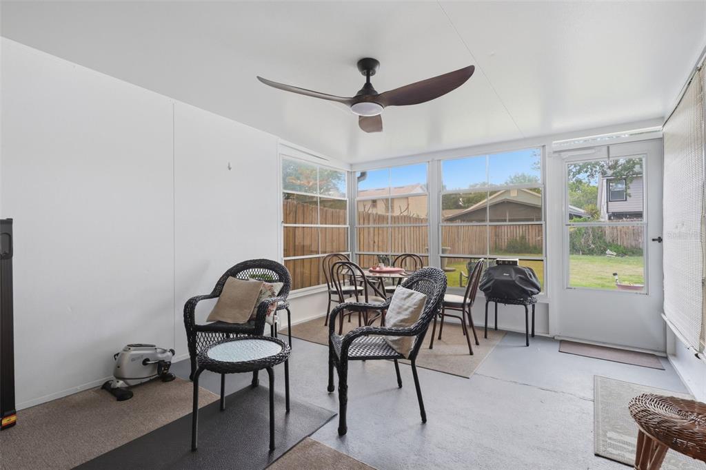 3440 Allston Lane Winter Park, FL 32792 - Photo 23 of 37 a dining room with furniture and a window