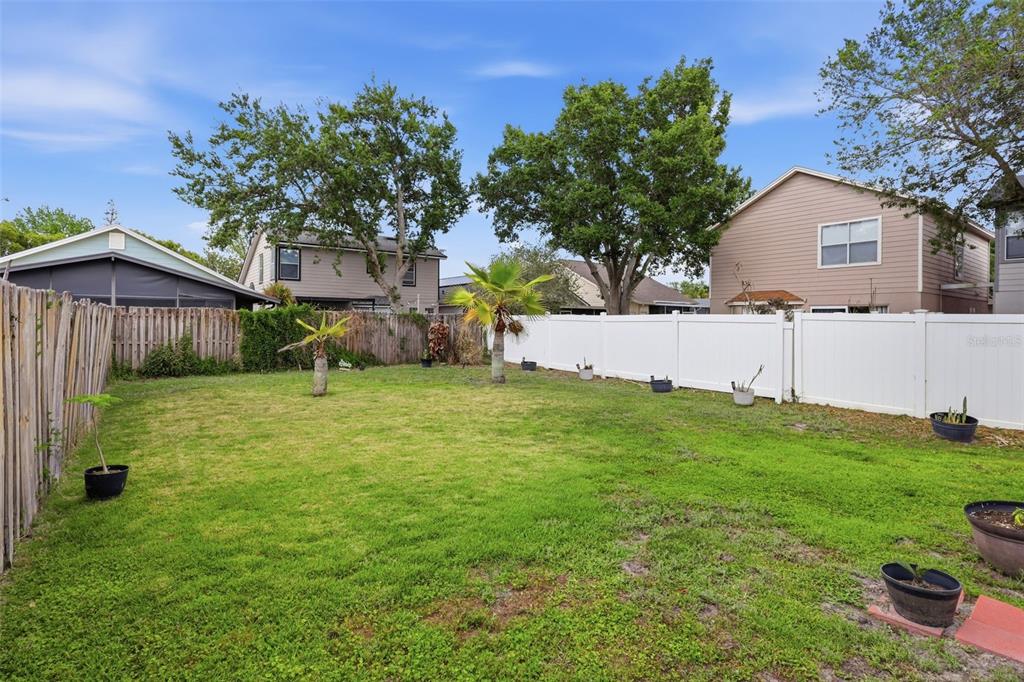 3440 Allston Lane Winter Park, FL 32792 - Photo 25 of 37 a view of backyard with a garden and entertaining space