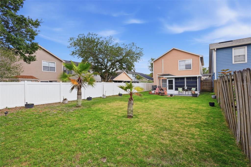 3440 Allston Lane Winter Park, FL 32792 - Photo 27 of 37 a view of a house with a yard and a tree