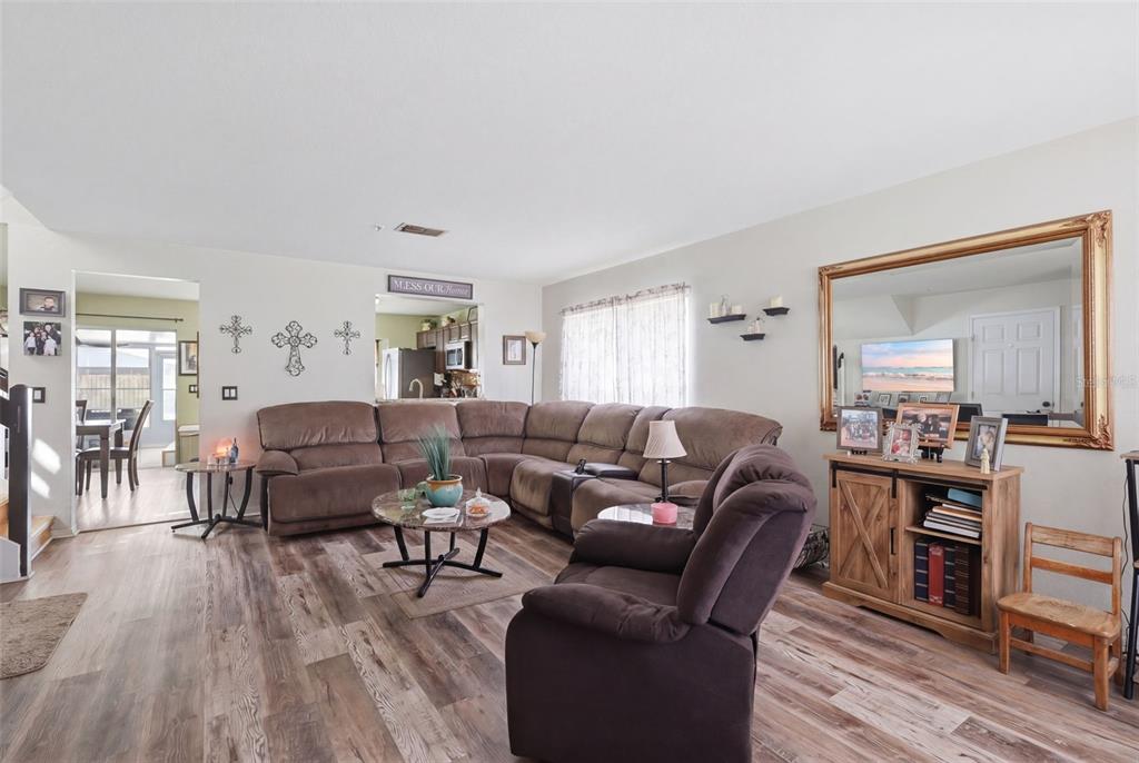 3440 Allston Lane Winter Park, FL 32792 - Photo 6 of 37 a living room with furniture and wooden floor
