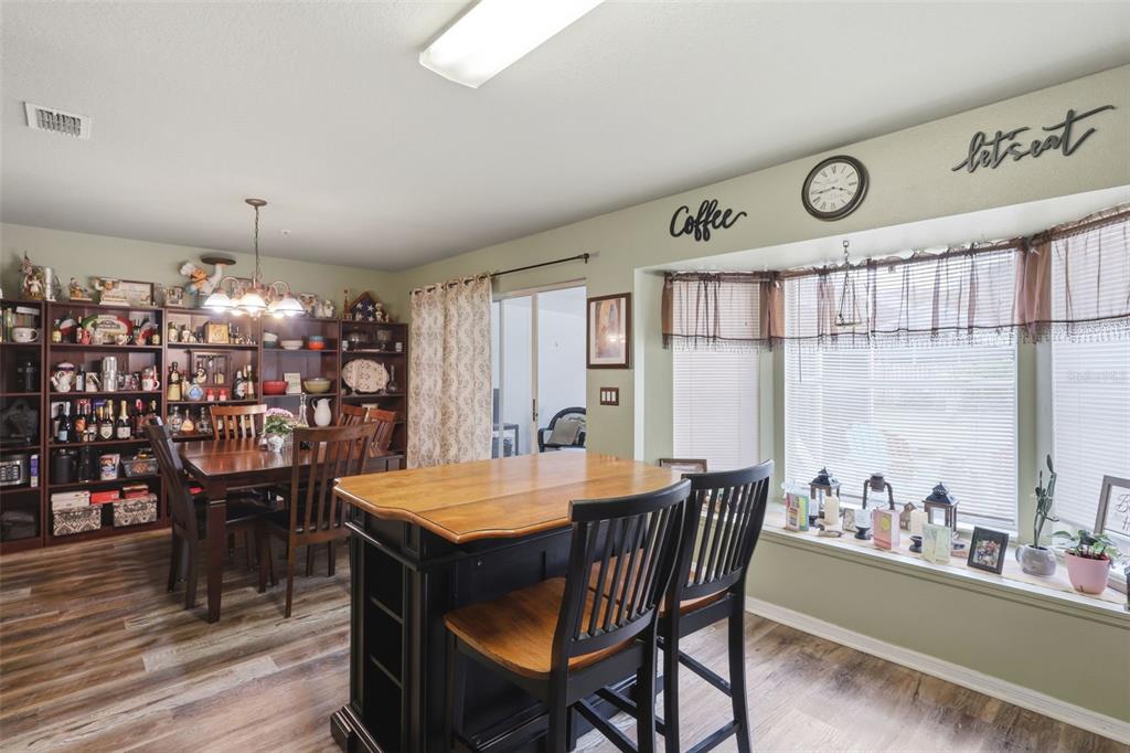 3440 Allston Lane Winter Park, FL 32792 - Photo 10 of 37 a view of a dining room with furniture and window