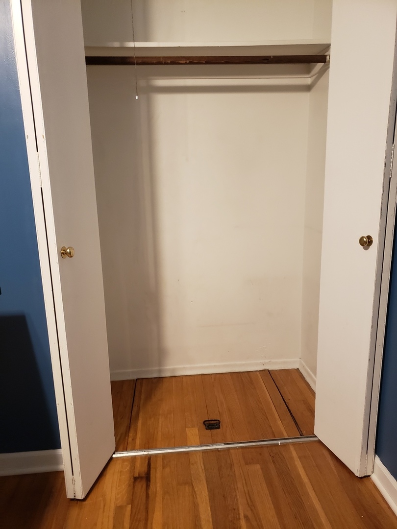 15230 Ridgeway Avenue Midlothian, IL 60445 - Photo 15 of 21 a view of walk in closet with empty space