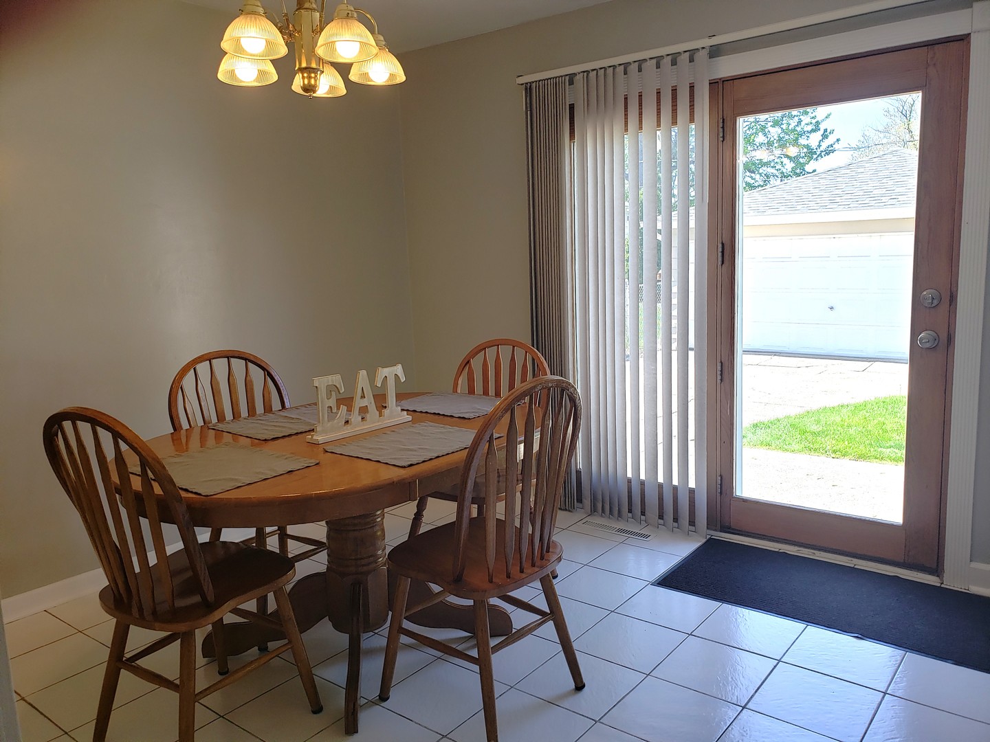 15230 Ridgeway Avenue Midlothian, IL 60445 - Photo 4 of 21 a view of a dining room with furniture window and outside view