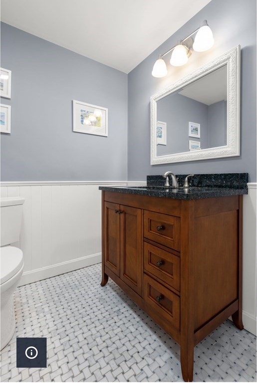 30 3 Ponds Road Wayland, MA 01778 - Photo 11 of 28 a bathroom with a sink a toilet and mirror