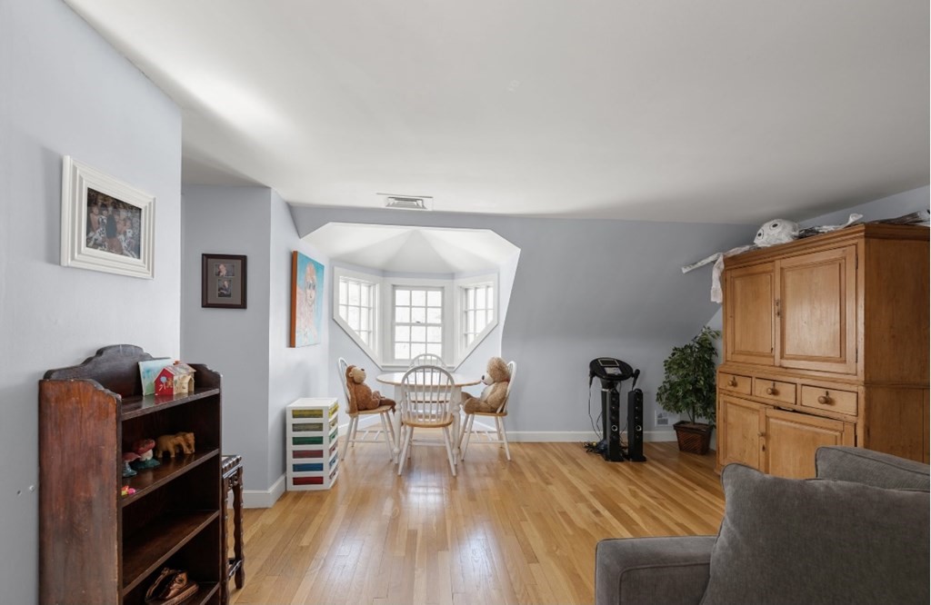 30 3 Ponds Road Wayland, MA 01778 - Photo 15 of 28 a living room with furniture and wooden floor