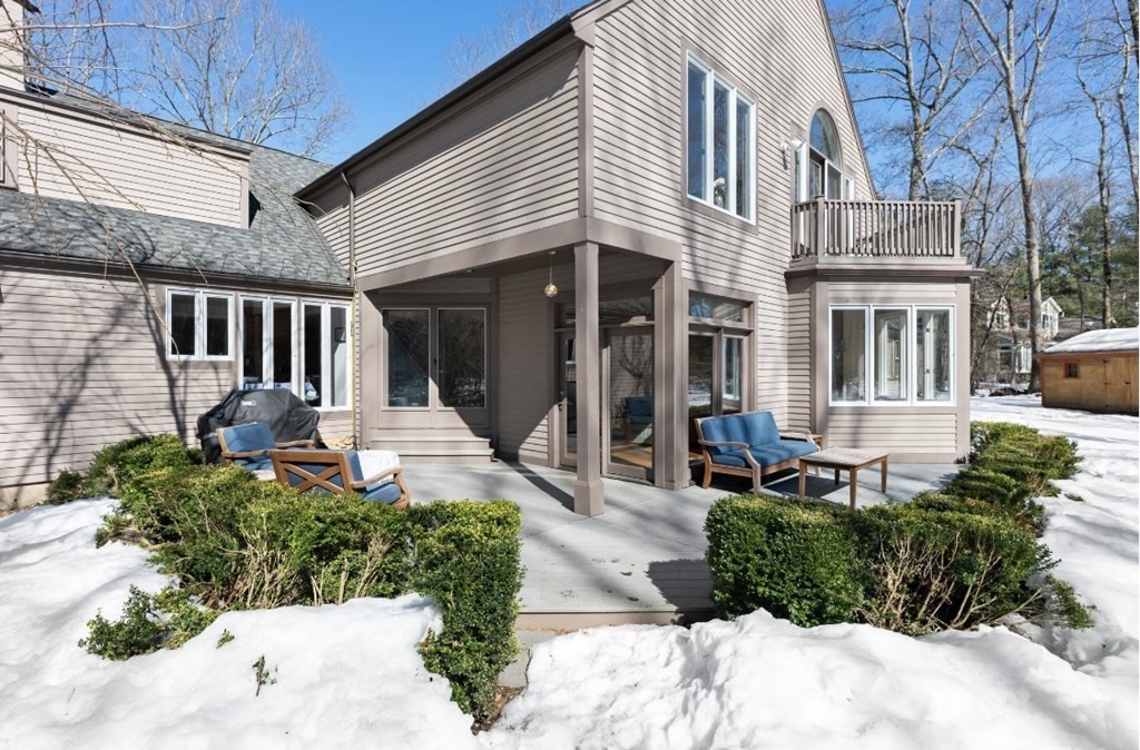 30 3 Ponds Road Wayland, MA 01778 - Photo 28 of 28 a front view of a house with a yard