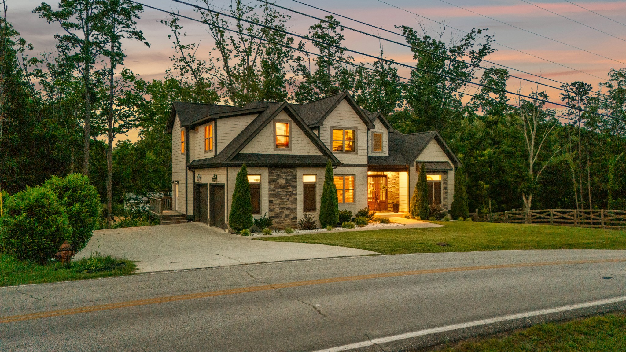 a front view of a house with a yard