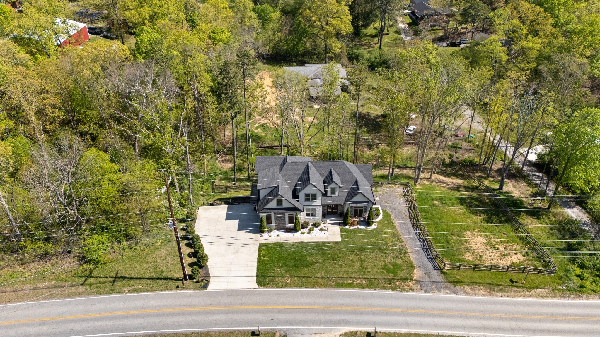 8417 Pine Ridge Road Ooltewah, TN 37363 - Photo 28 of 28 a aerial view of a house with a yard