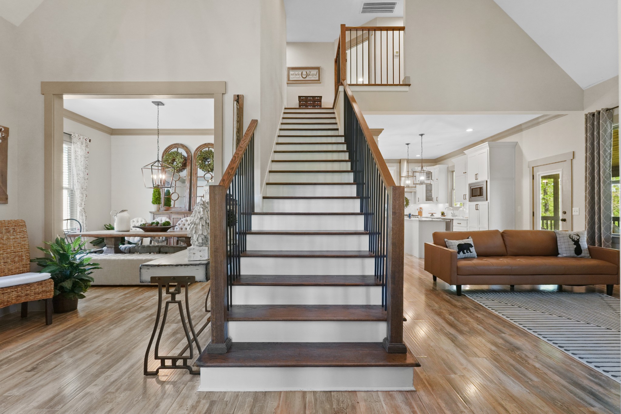 8417 Pine Ridge Road Ooltewah, TN 37363 - Photo 4 of 28 a living room with furniture and a chandelier