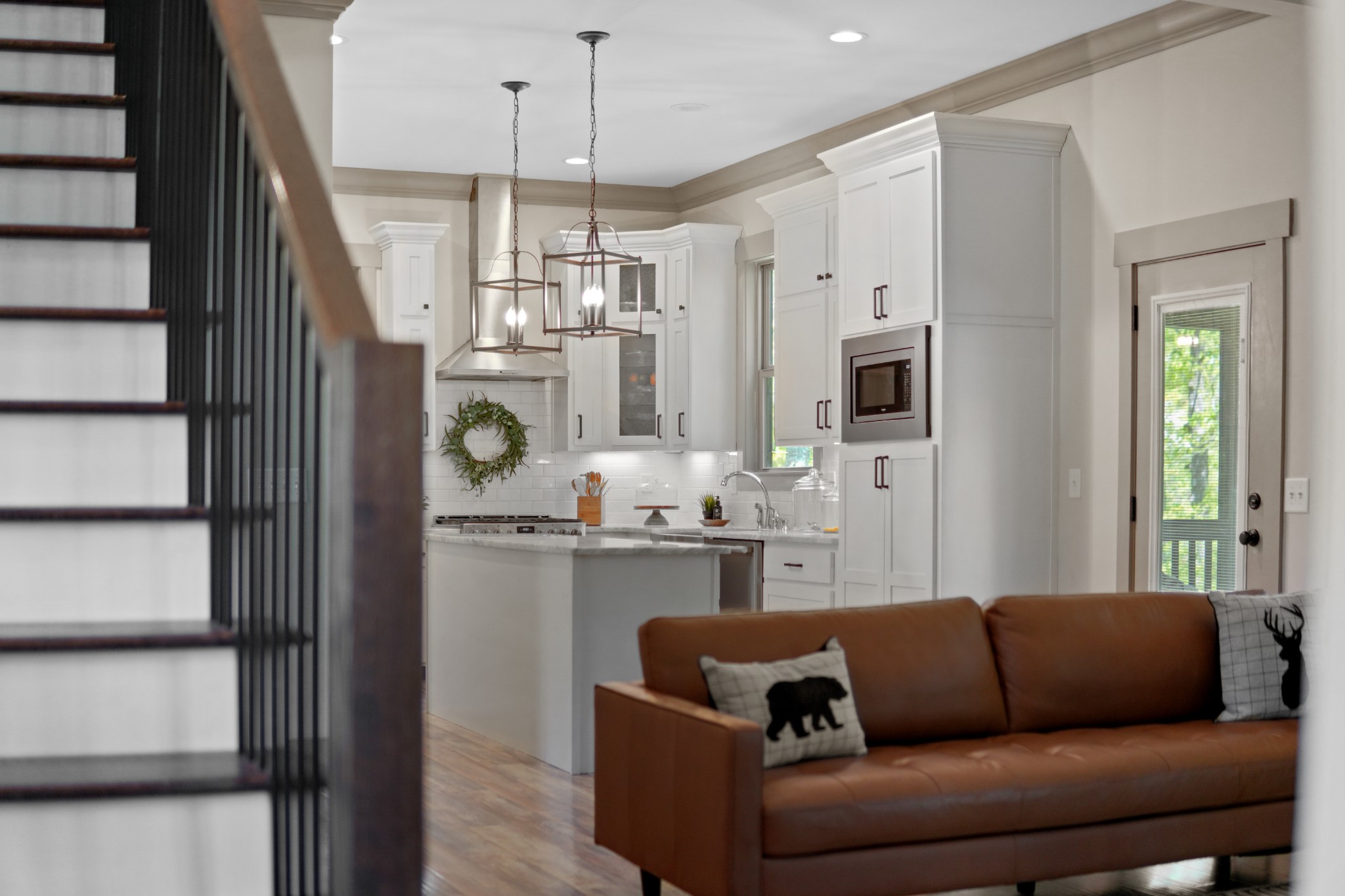 8417 Pine Ridge Road Ooltewah, TN 37363 - Photo 6 of 28 a living room with stainless steel appliances granite countertop furniture and a kitchen view