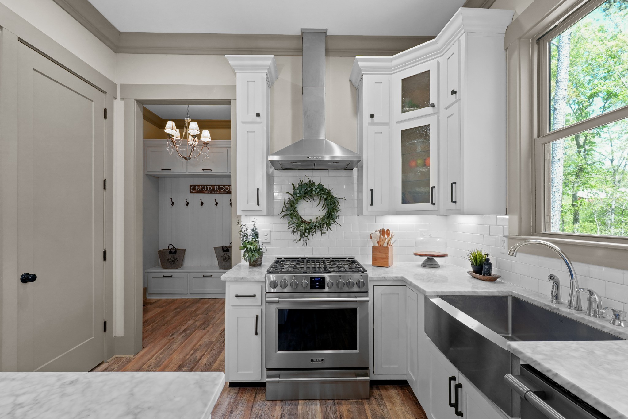 8417 Pine Ridge Road Ooltewah, TN 37363 - Photo 8 of 28 a kitchen with stainless steel appliances granite countertop a stove and a sink