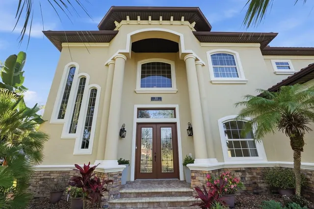 a front view of a house with a porch