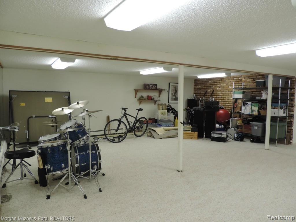 7900 Foster Road Clarkston, MI 48346 - Photo 21 of 30 Finished, walkout lower level