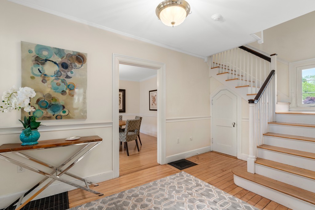 8-10 Upland Road Wellesley, MA 02482 - Photo 13 of 24 a view of an entryway and wooden floor