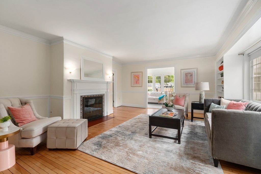 8-10 Upland Road Wellesley, MA 02482 - Photo 2 of 24 a living room with furniture and a fireplace
