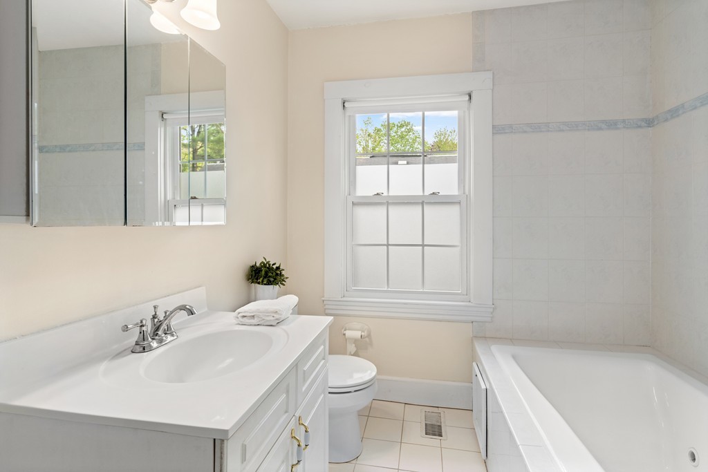 8-10 Upland Road Wellesley, MA 02482 - Photo 21 of 24 a bathroom with a sink toilet and tub