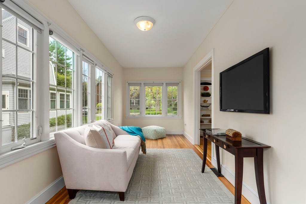 8-10 Upland Road Wellesley, MA 02482 - Photo 5 of 24 a living room with furniture and a flat screen tv