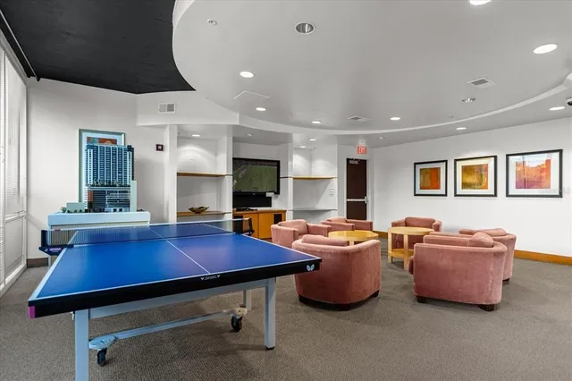 a view of a workspace with furniture