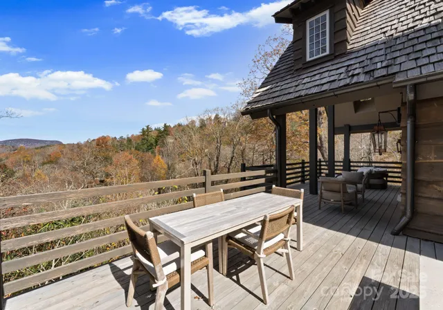 a view of a patio with wooden floor